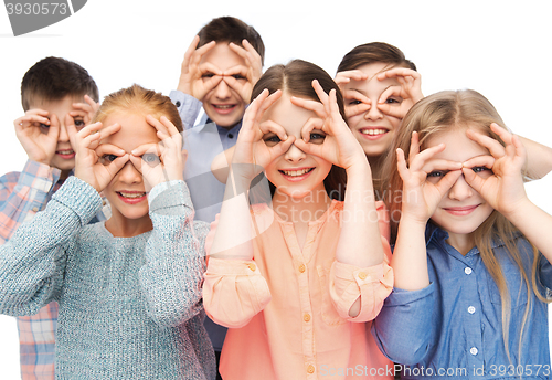 Image of happy children making faces and having fun