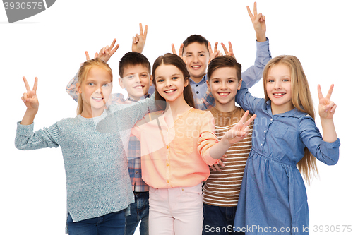 Image of happy children showing peace hand sign