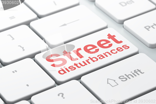 Image of Political concept: Street Disturbances on computer keyboard background