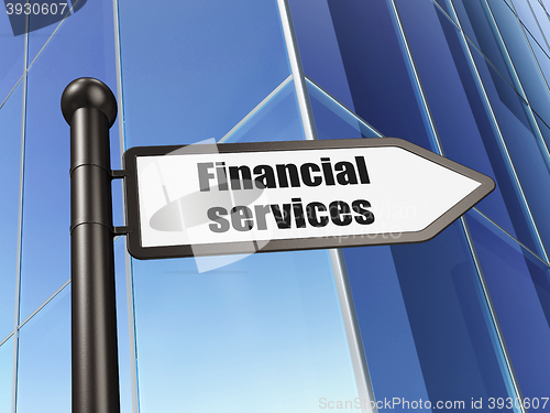 Image of Money concept: sign Financial Services on Building background