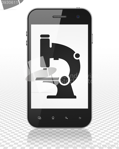 Image of Science concept: Smartphone with Microscope on display