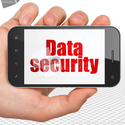 Image of Safety concept: Hand Holding Smartphone with Data Security on display