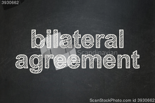 Image of Insurance concept: Bilateral Agreement on chalkboard background