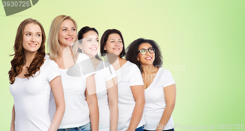 Image of group of happy different women in white t-shirts