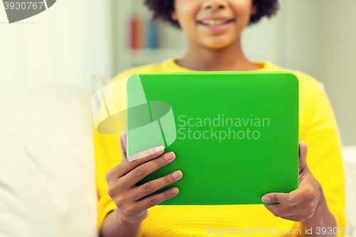 Image of happy african american woman with tablet pc
