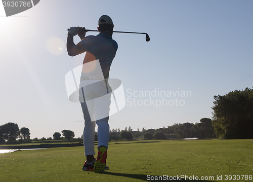 Image of golf player hitting shot