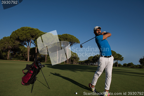 Image of golf player hitting shot