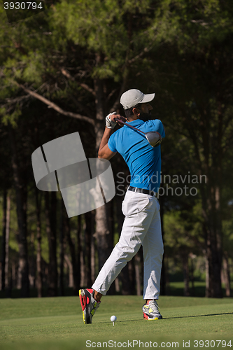 Image of golf player hitting shot