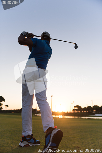 Image of golfer hitting long shot