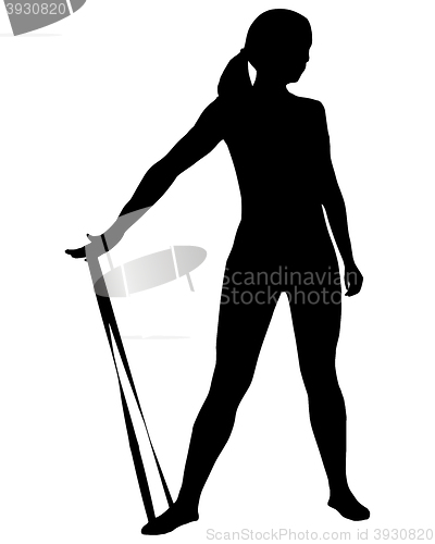 Image of Silhouette of woman doing exercises