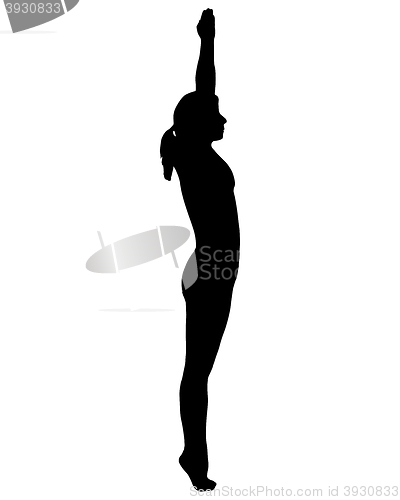 Image of Silhouette of woman doing yoga