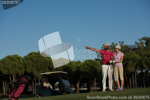 Image of portrait of couple on golf course