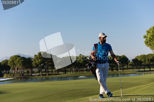 Image of golfer  portrait at golf  course