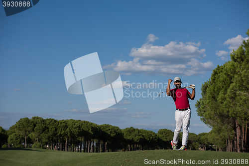 Image of golf player hitting long shot