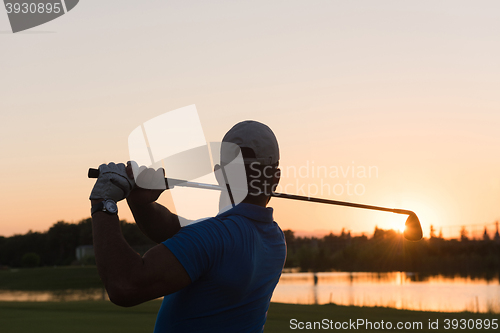 Image of golfer hitting long shot