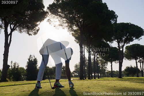 Image of golf player hitting shot