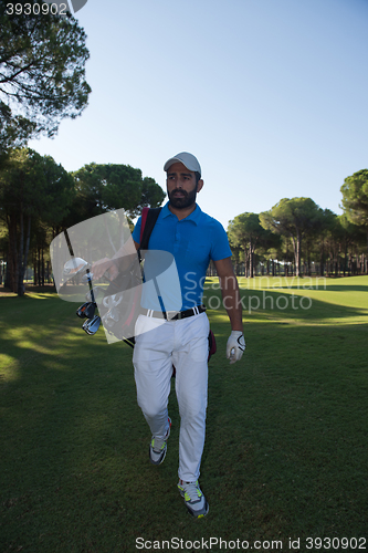 Image of golf player walking