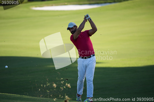 Image of golf player hitting long shot