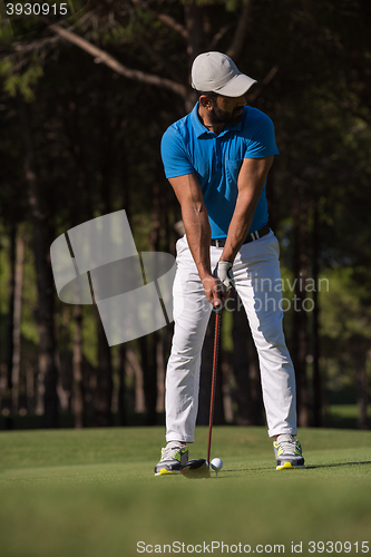 Image of golf player hitting shot