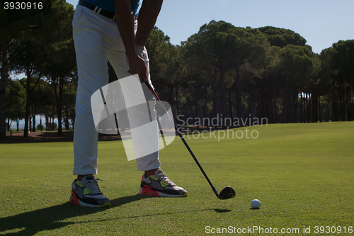 Image of golf player hitting shot