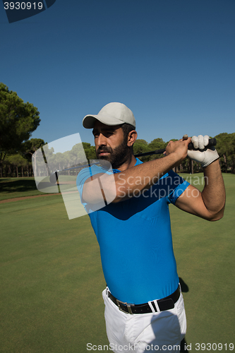 Image of golf player hitting shot