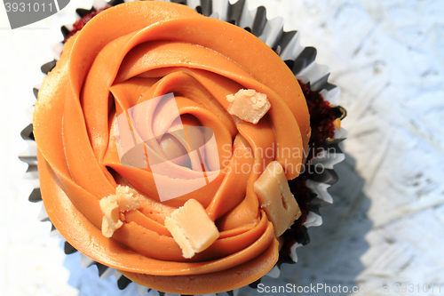 Image of caramel cupcake isolated