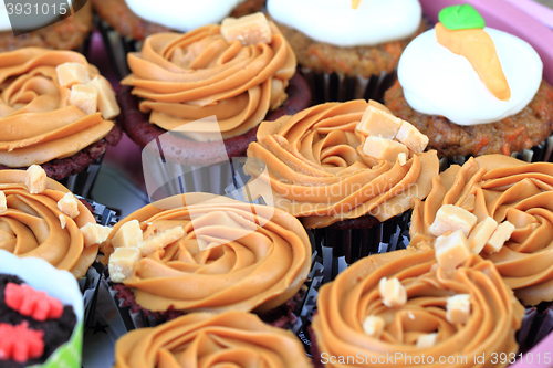 Image of caramel cupcakes background