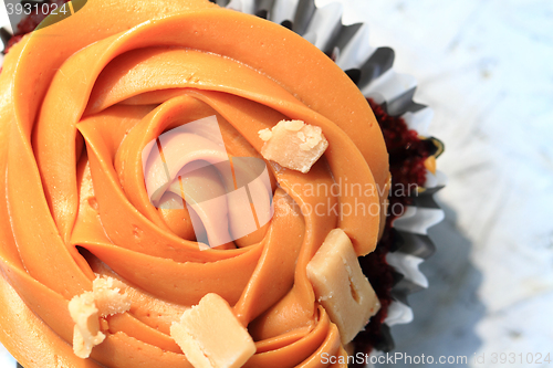 Image of caramel cupcake isolated