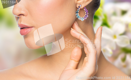 Image of close up of beautiful woman face with earring