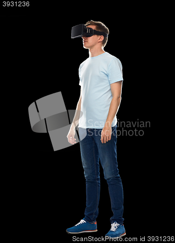 Image of happy man in virtual reality headset or 3d glasses