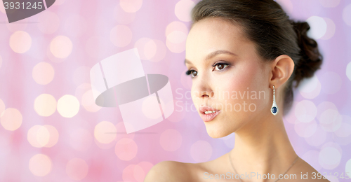 Image of close up of beautiful woman face with earring