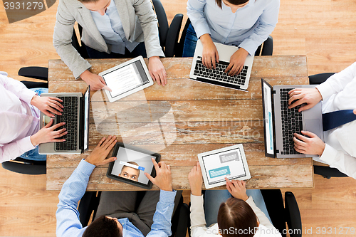 Image of business team with laptop and tablet pc computers