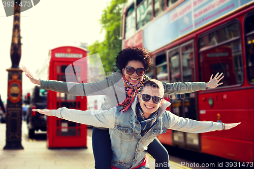 Image of happy teenage couple having fun in london city