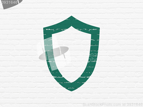 Image of Security concept: Contoured Shield on wall background