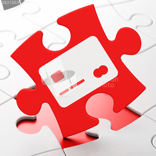Image of Currency concept: Credit Card on puzzle background