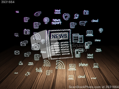 Image of News concept: Newspaper in grunge dark room