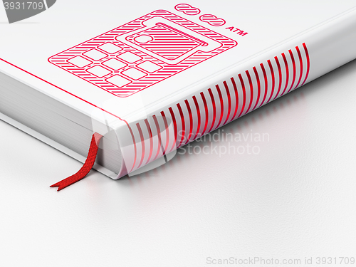 Image of Money concept: closed book, ATM Machine on white background