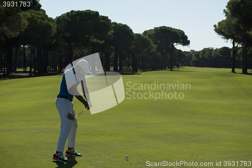 Image of golf player hitting shot