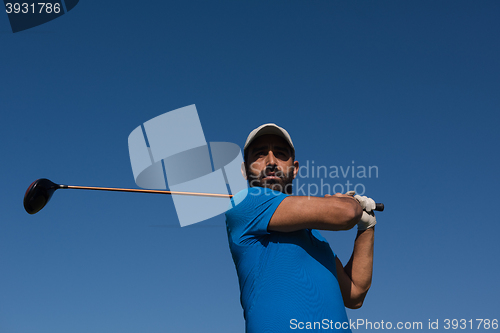 Image of golf player hitting shot