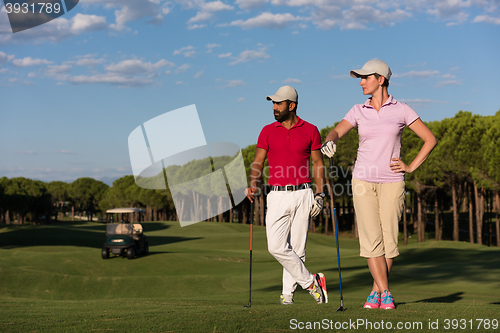 Image of portrait of couple on golf course