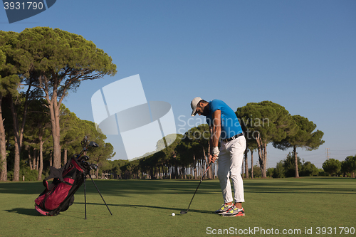 Image of golf player hitting shot