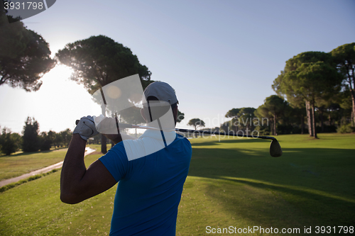 Image of golf player hitting shot