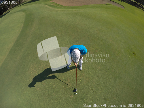 Image of top view of golf player hitting shot