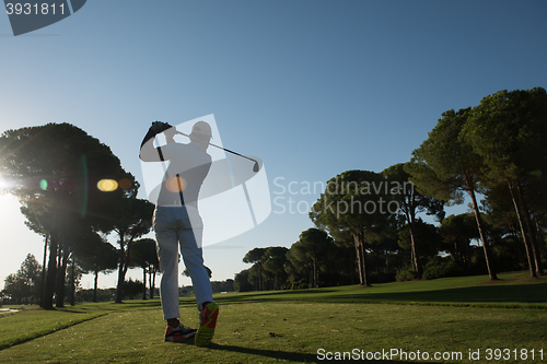 Image of golf player hitting shot