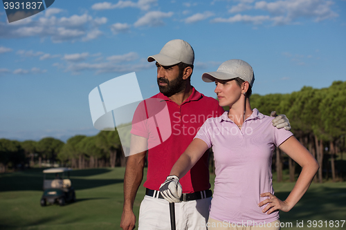 Image of portrait of couple on golf course