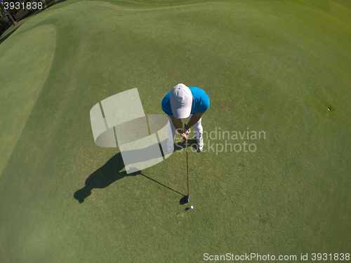 Image of top view of golf player hitting shot