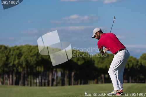 Image of golf player hitting long shot