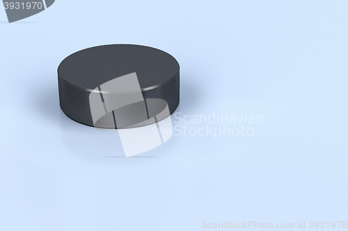 Image of Hockey puck on ice 