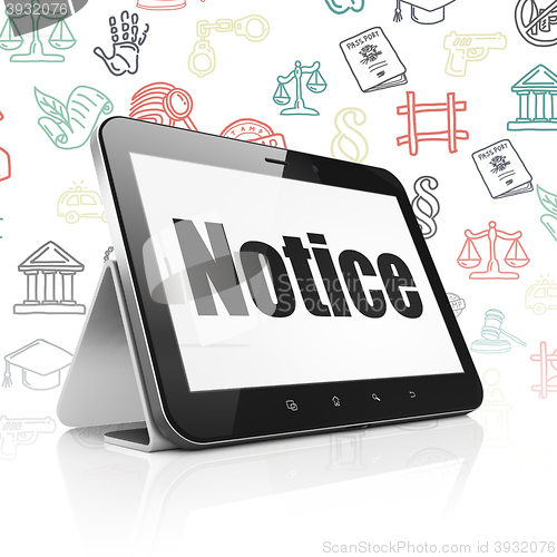 Image of Law concept: Tablet Computer with Notice on display