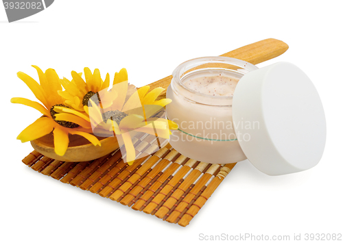 Image of Spa cosmetic cream and flowers isolated on white